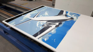 Vitreous enamel panel with several layers of screen printed colours